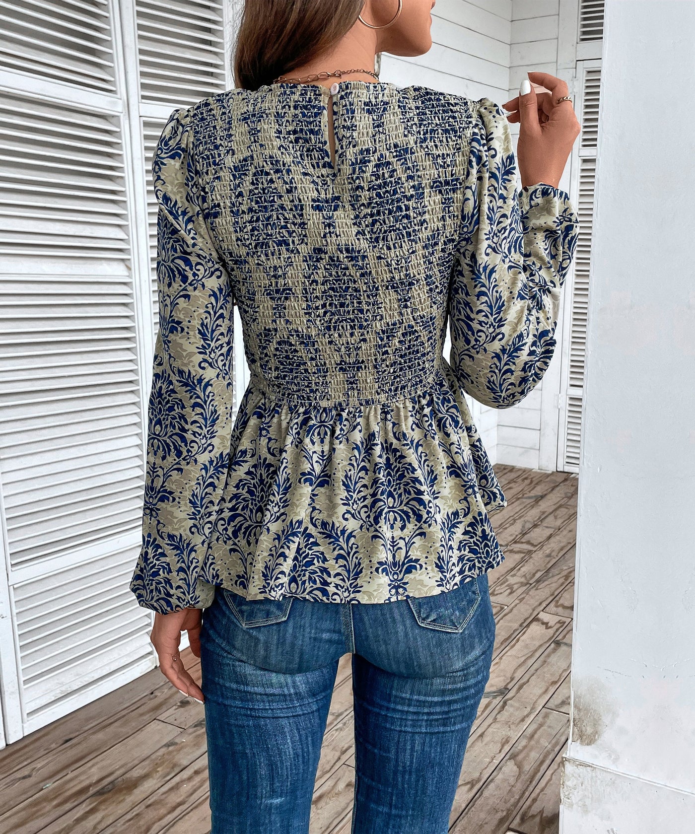 Top peplum fruncido con estampado floral para mujer