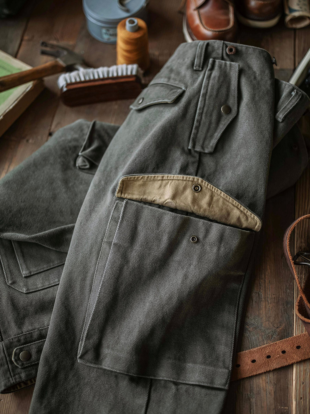 Pantalones resistentes de granito de 21.5 oz