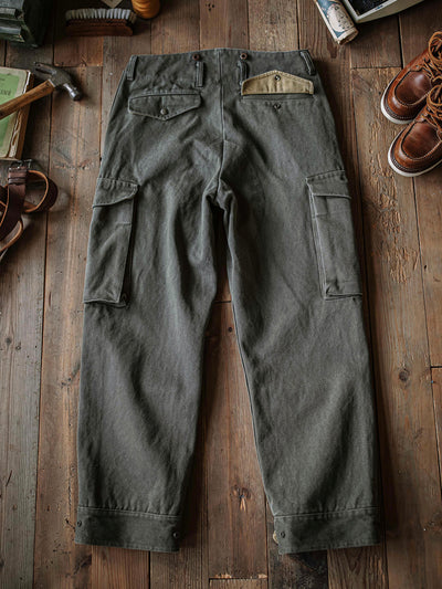 Pantalones resistentes de granito de 21.5 oz