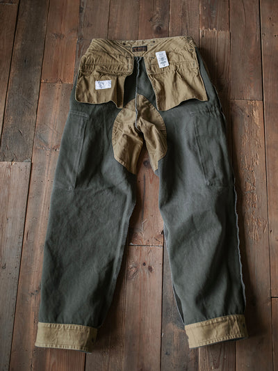 Pantalones resistentes de granito de 21.5 oz