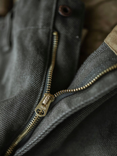 Pantalones resistentes de granito de 21.5 oz
